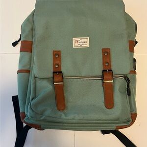 Green and Brown Canvas Backpack with Leather Accents